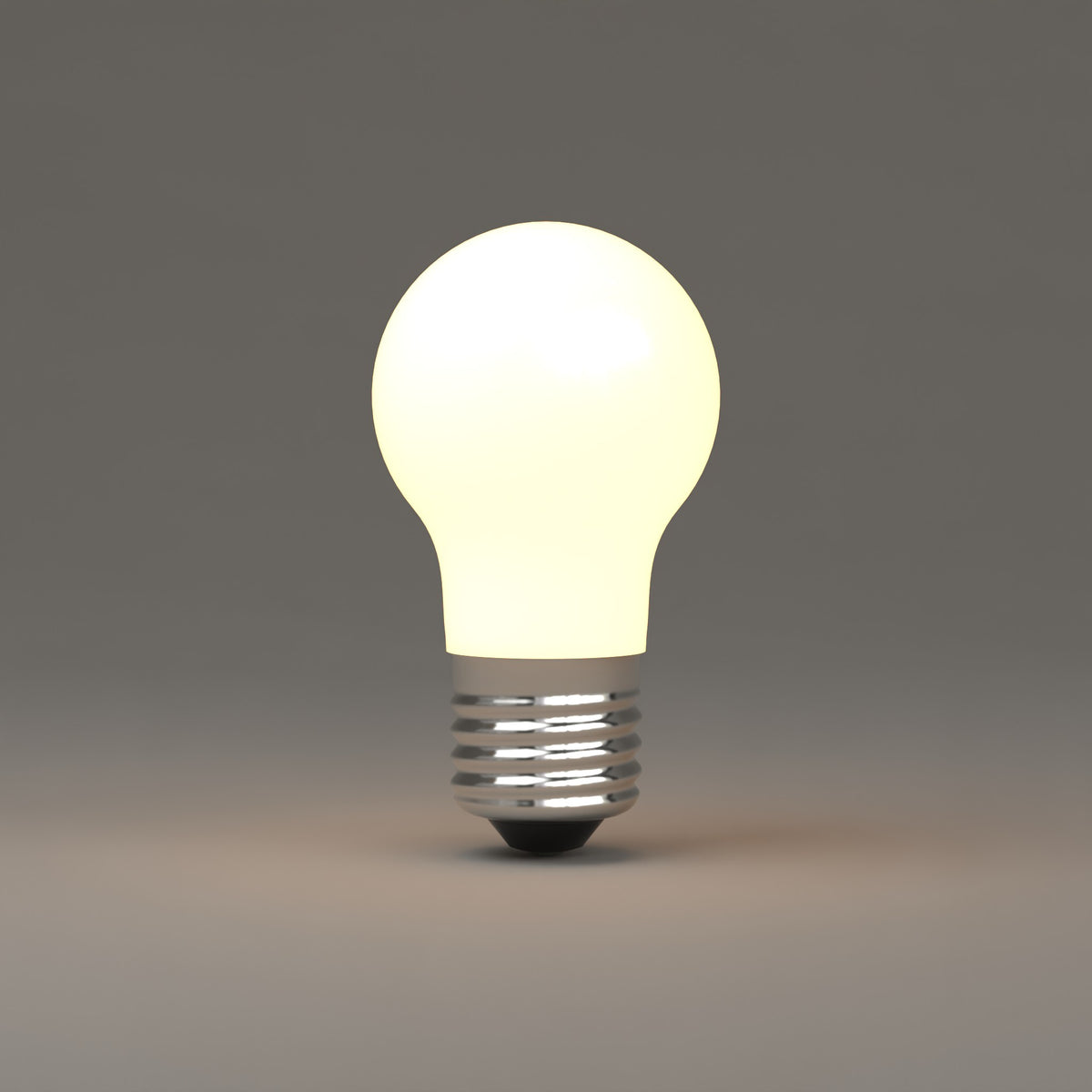 LED A15 Bulb - Frosted White lit, glowing warm white at 3000K. Dutton Brown lighting