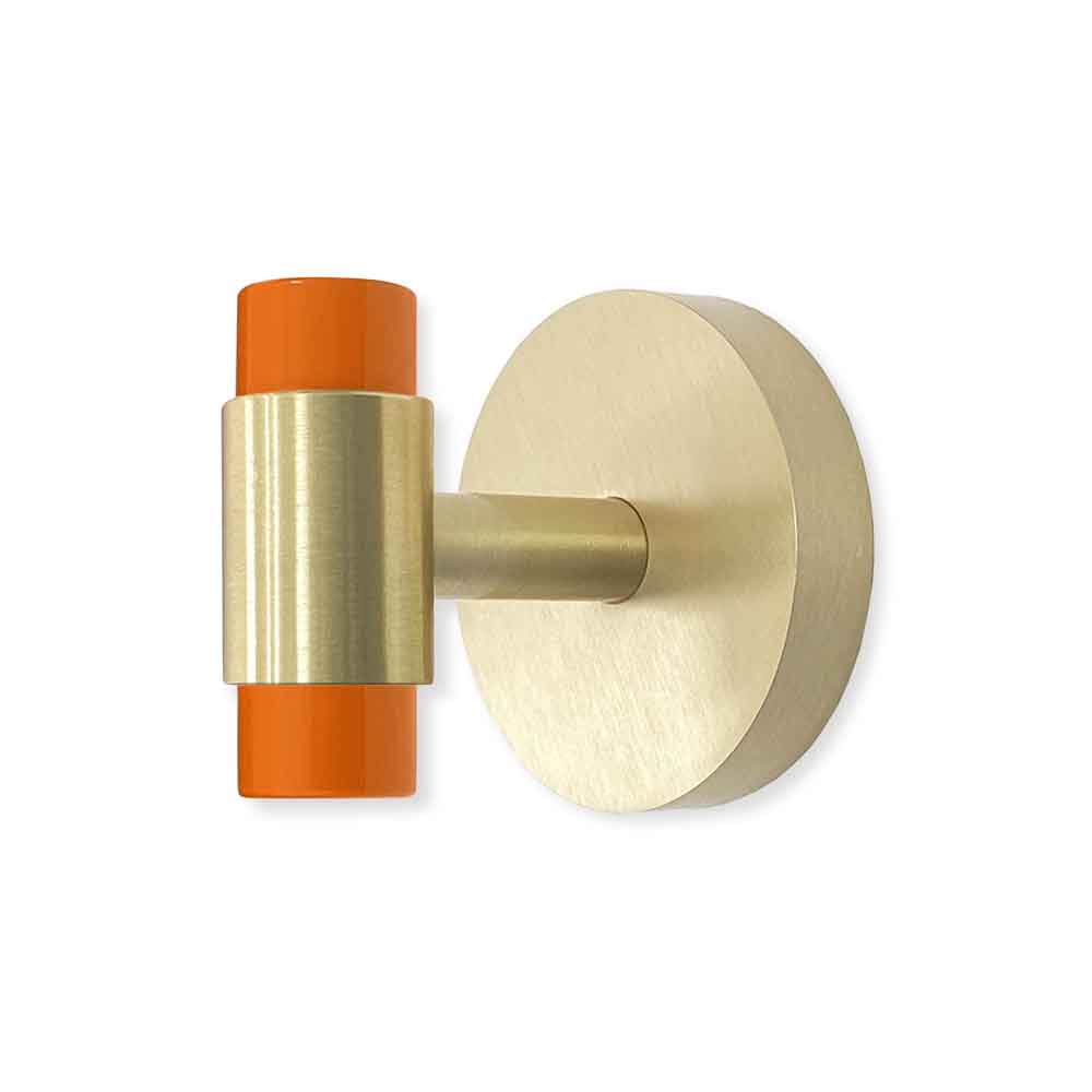 Brass and orange color Persona hook Dutton Brown hardware