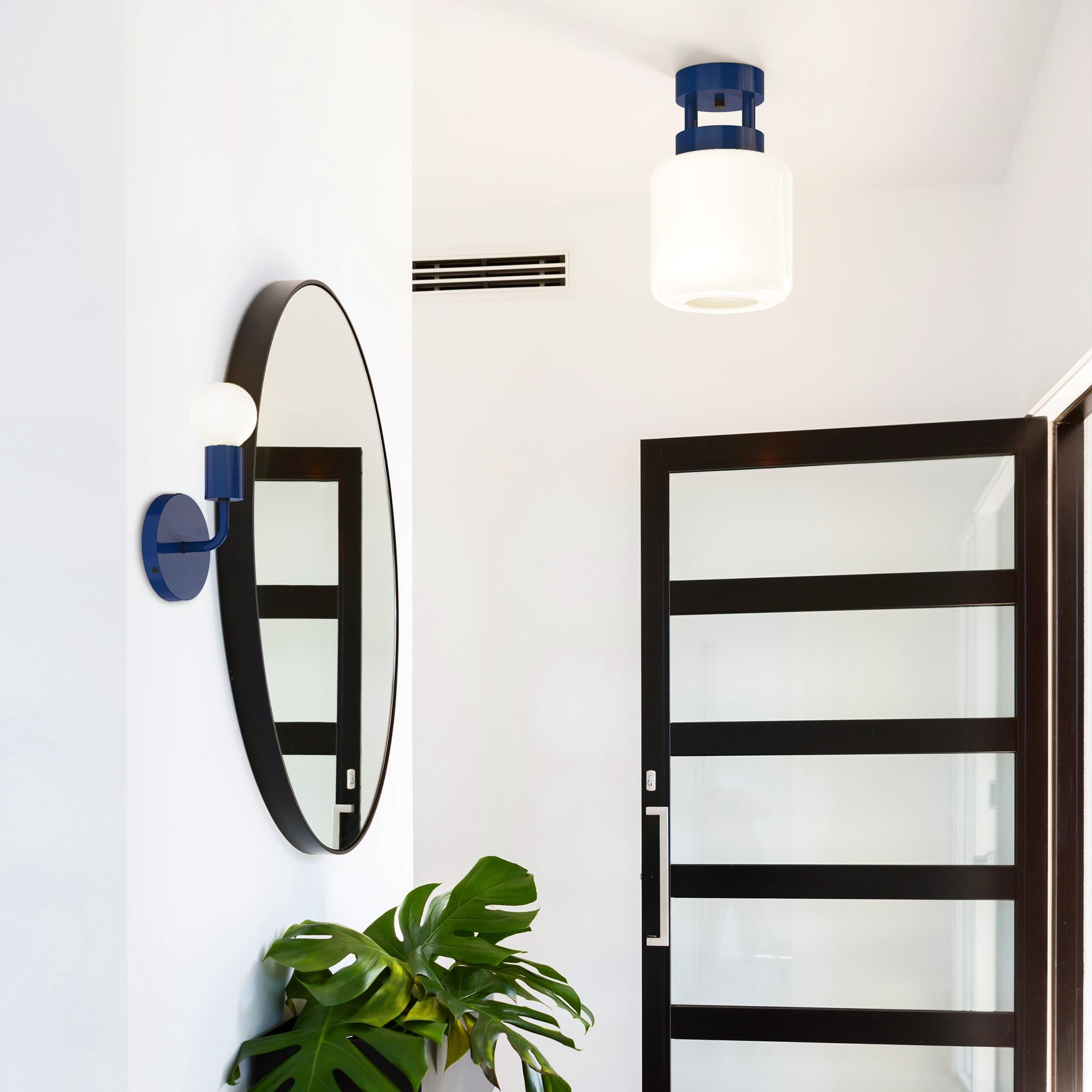 Black and cobalt blue color snug sconce foyer scene dutton brown lighting