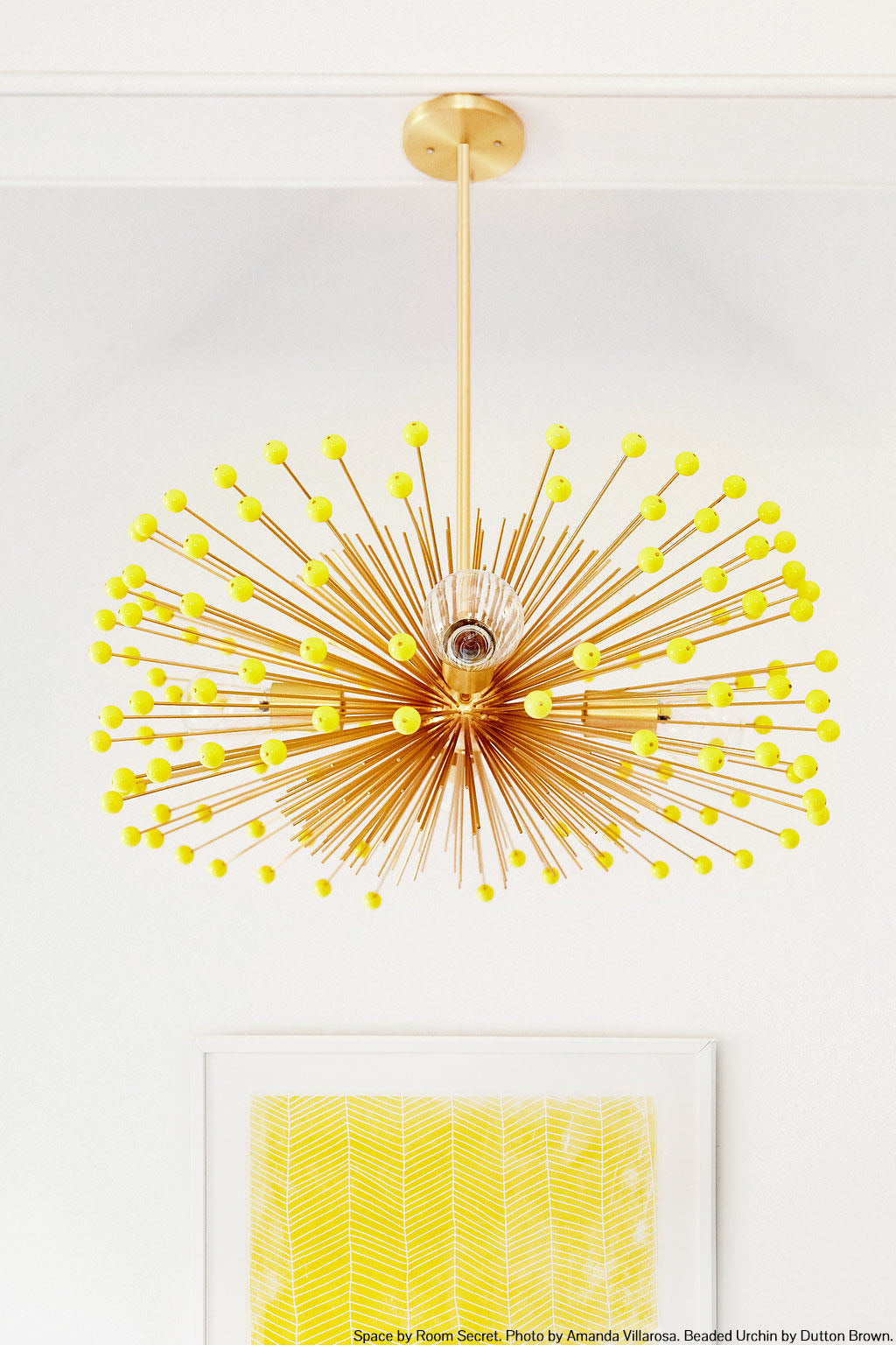 Brass and ochre color Beaded Urchin chandelier 27" by Dutton Brown. Space by Room Secret. Photo by Amanda Villanueva.