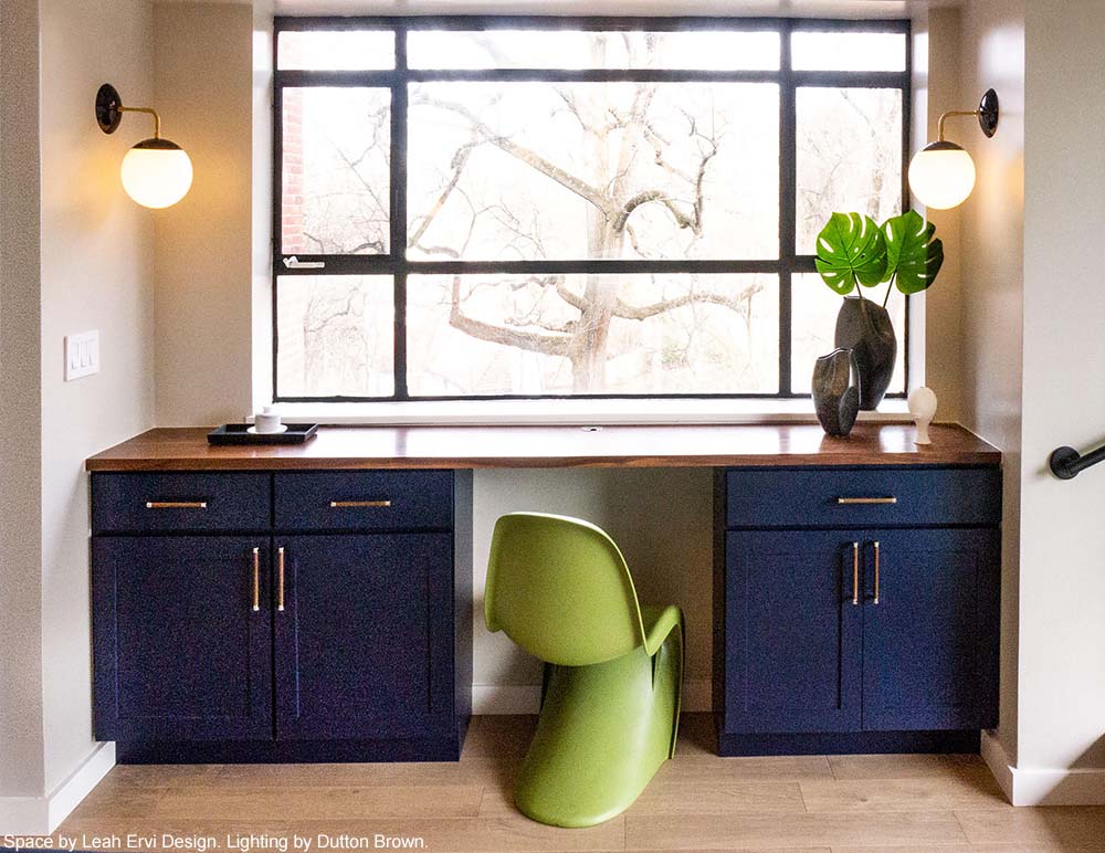 Brass and navy color Cap sconce 8 "by Dutton Brown. Space by Leah Ervi Design _hover