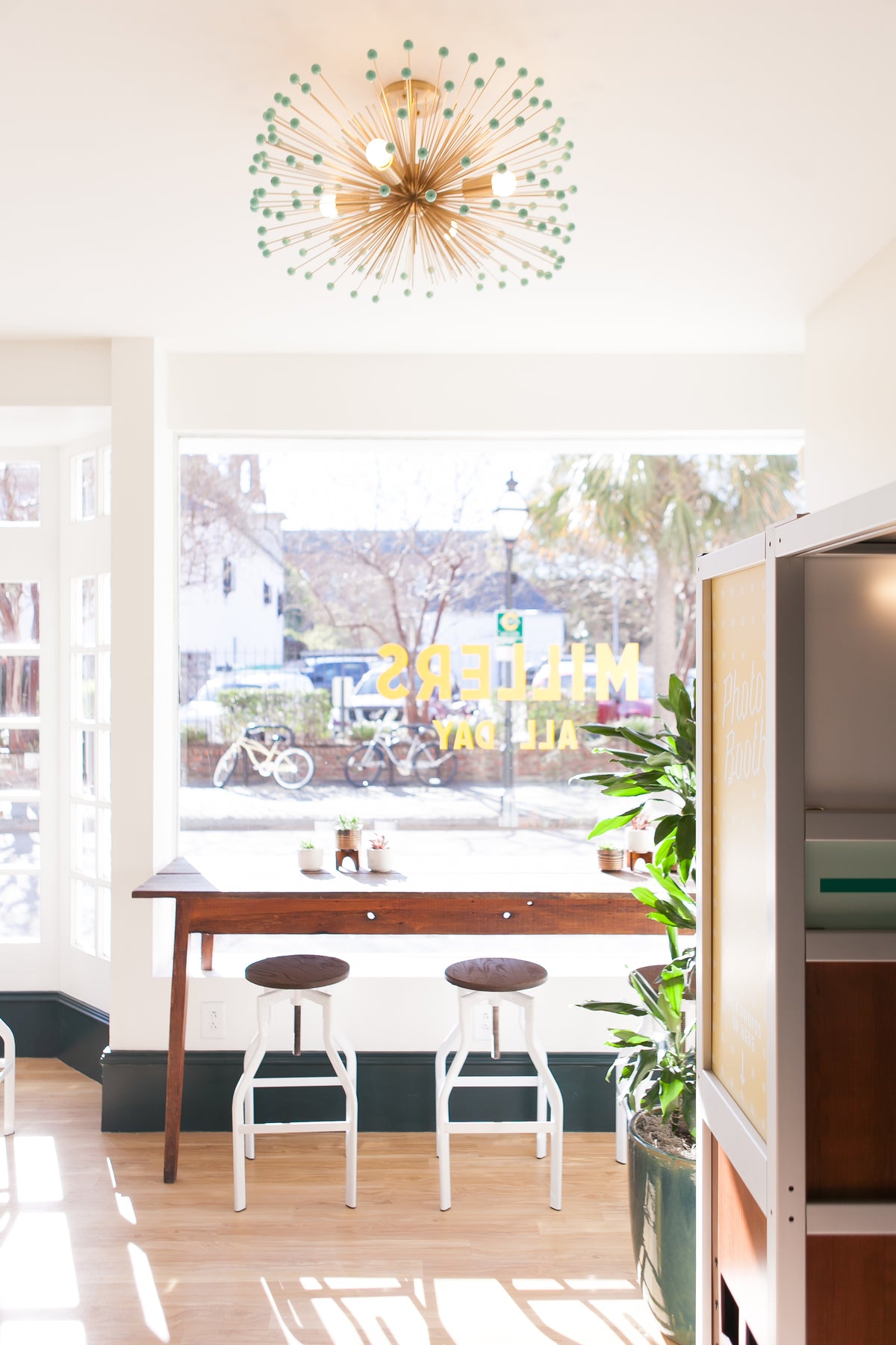 Brass and spa color Beaded Urchin chandelier 27" by Dutton Brown. Space and photo by Leslie McKellar.