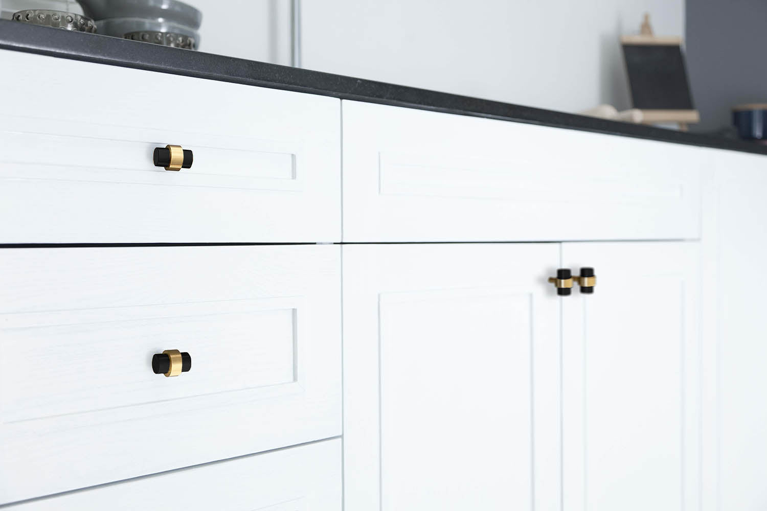 persona knob hardware satin brass kitchen cabinets by Dutton Brown.