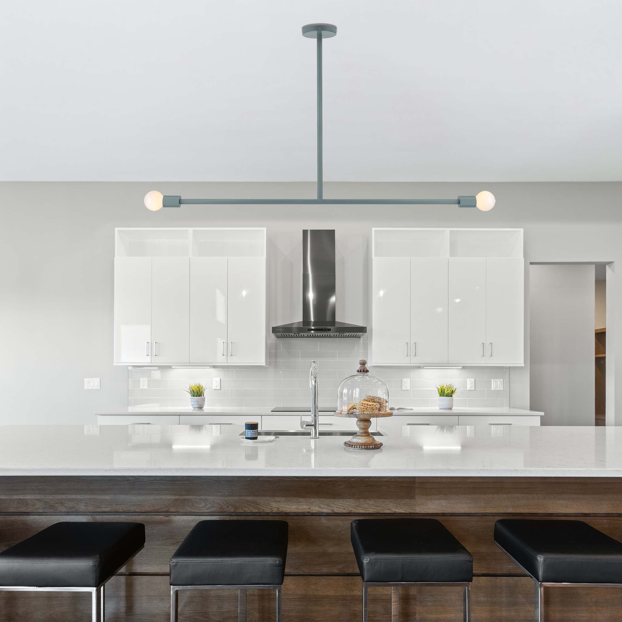 Lagoon color Pilot pendant 47" by Dutton Brown lightingDutton Brown. Photo by Kyle Jewell via Unsplash. _hover