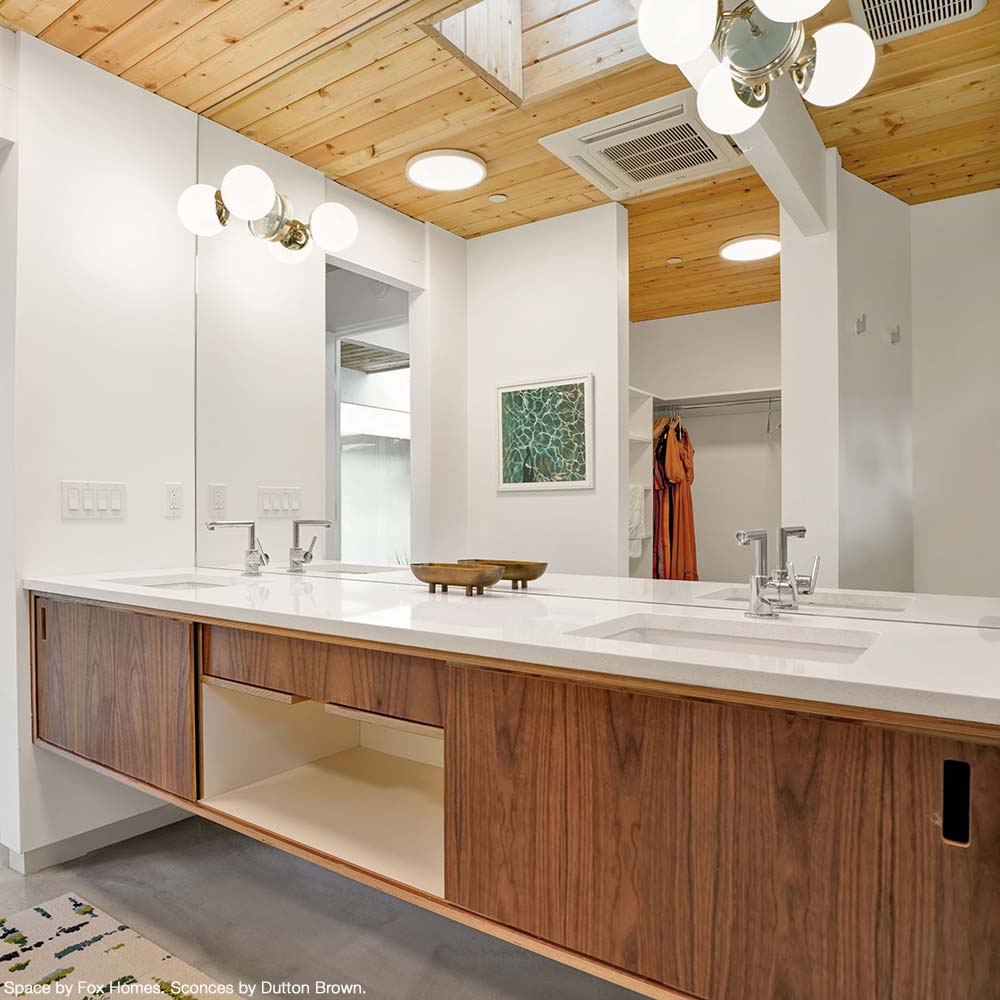 Nickel and spa color Visage sconce 6" by Dutton Brown. Space and photo by Fox Homes.