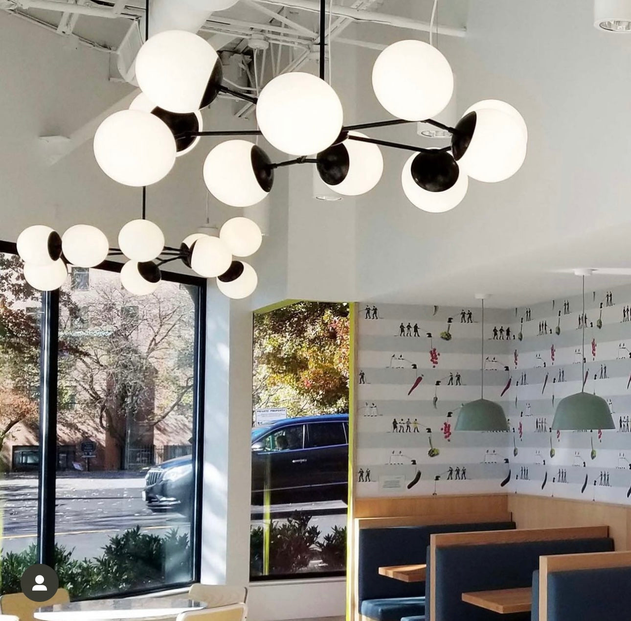 Black Crown chandelier 46" restaurant scene