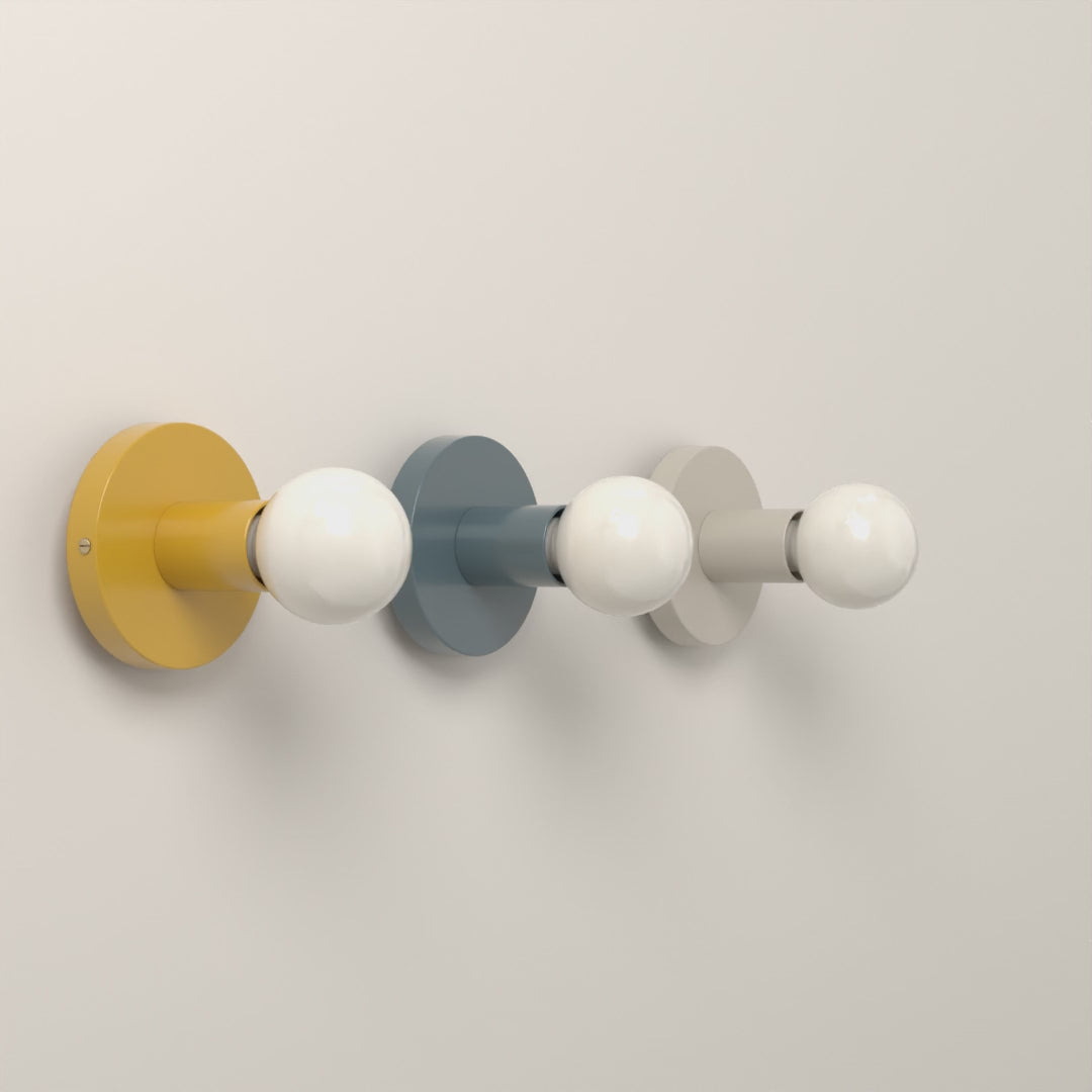 Twink Sconce in Ochre with Brass, Lagoon with Nickel and Bone with Black hardware, 8-second product video. Dutton Brown lighting