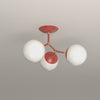 Supreme Flush Mount in Riding Hood Red with Brass hardware, 8-second product video. Dutton Brown lighting