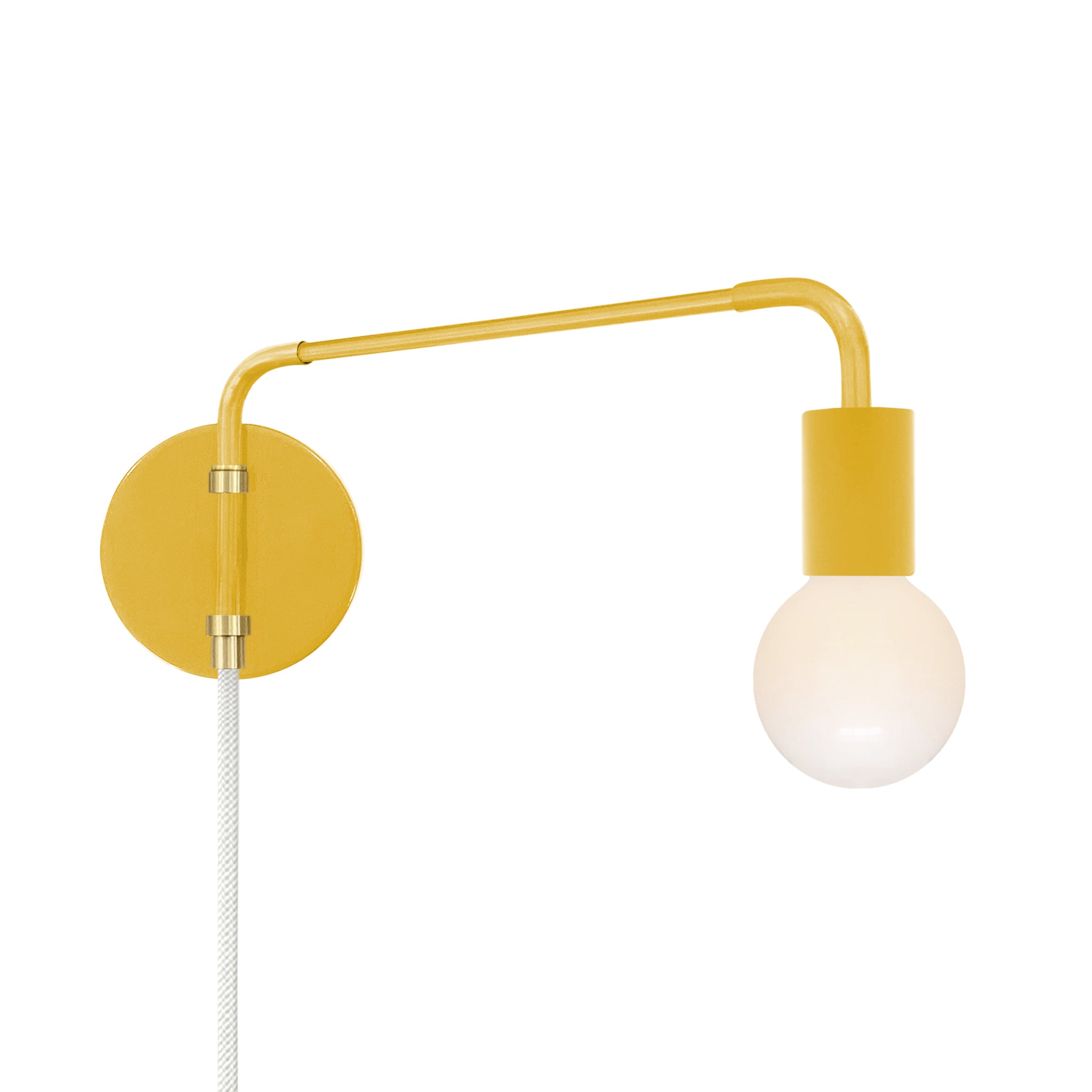 Brass and ochre color Sway plug-in sconce Dutton Brown lighting