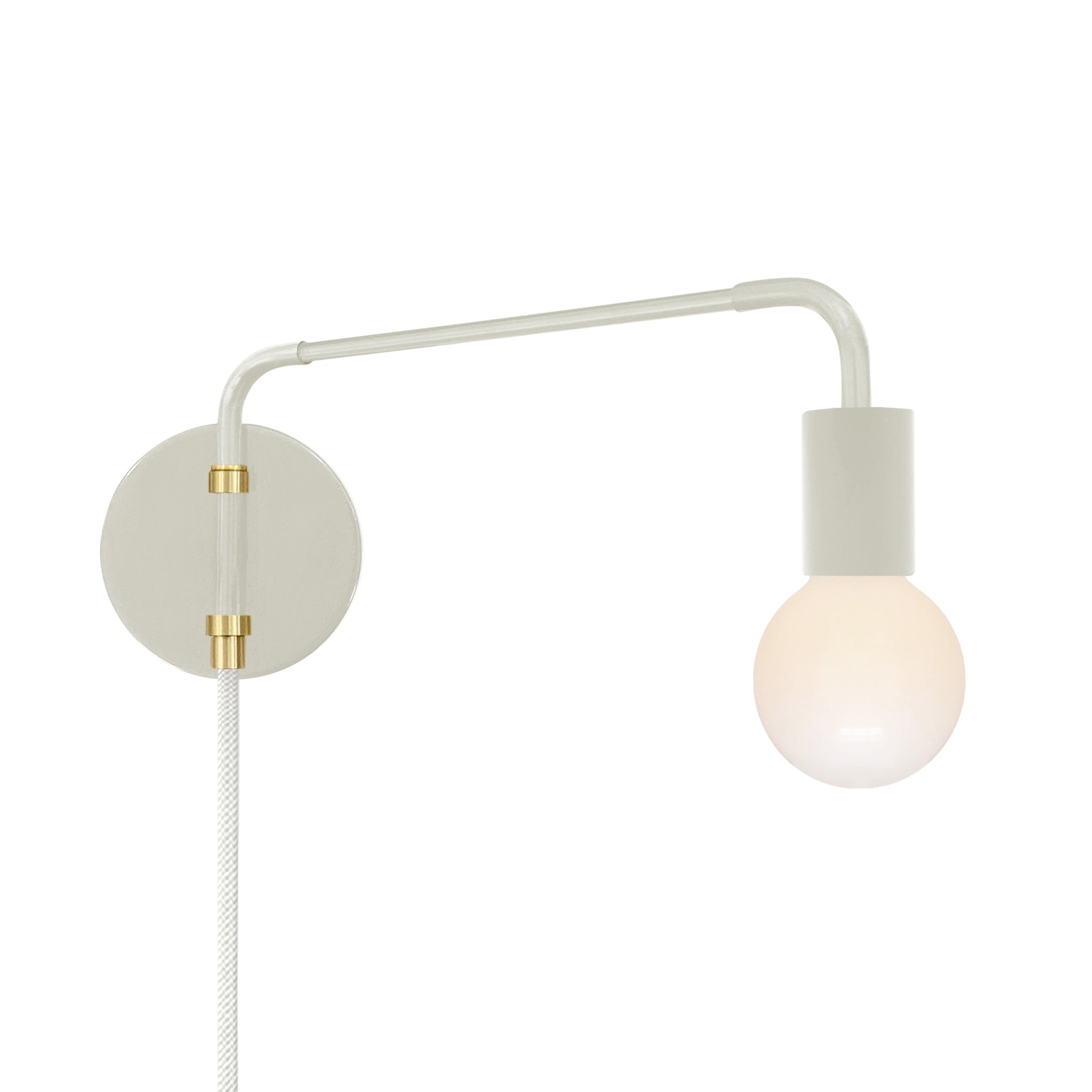 Brass and bone color Sway plug-in sconce Dutton Brown lighting
