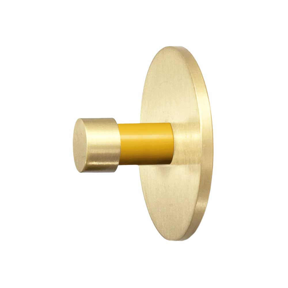 Brass and ochre color Bae knob Dutton Brown hardware