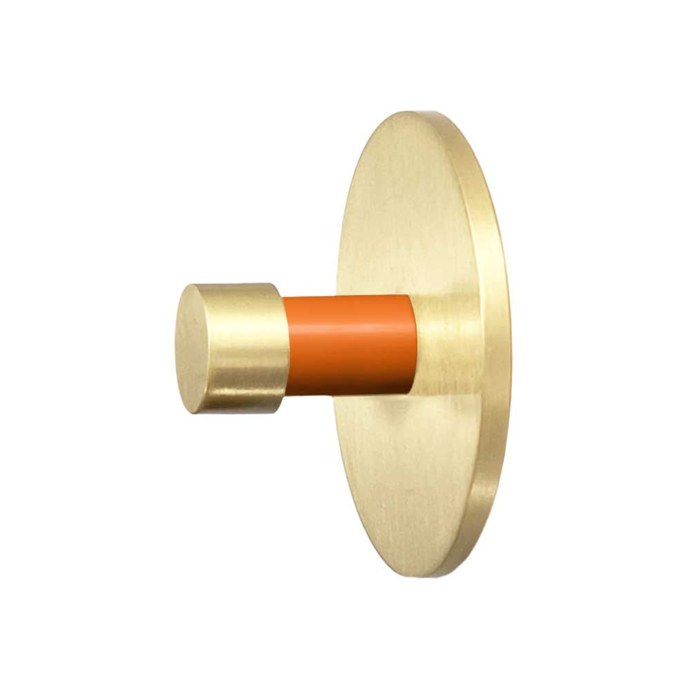 Brass and orange color Bae knob Dutton Brown hardware