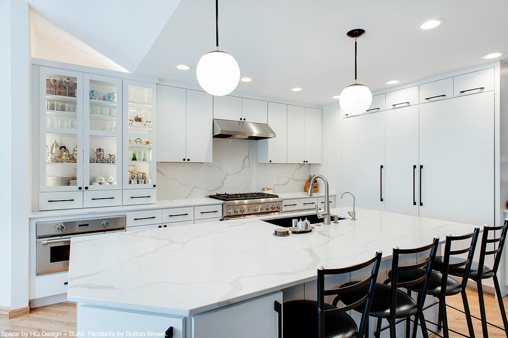 Black and nickel Cap pendant 10" by Dutton Brown. Space by HQ Design + Build.