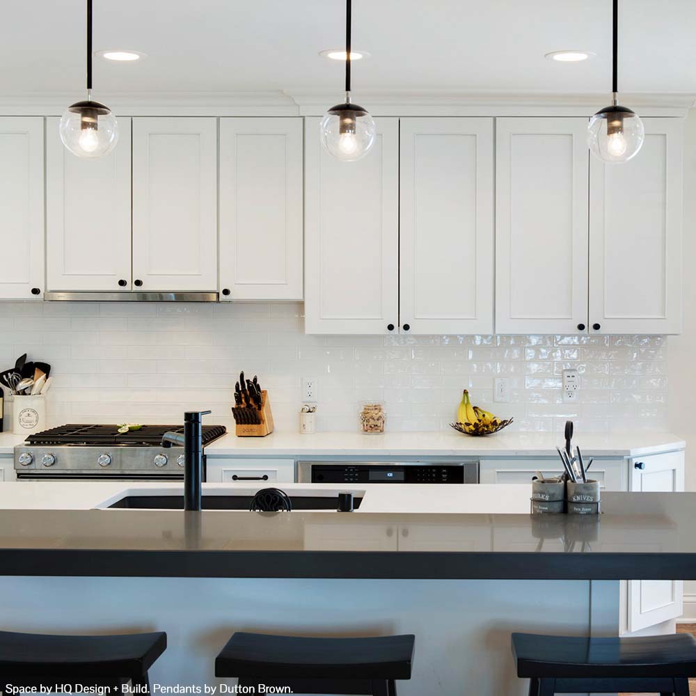 Nickel and black color Cap pendant 6" by Dutton Brown. Space by HQ Design + Build.
