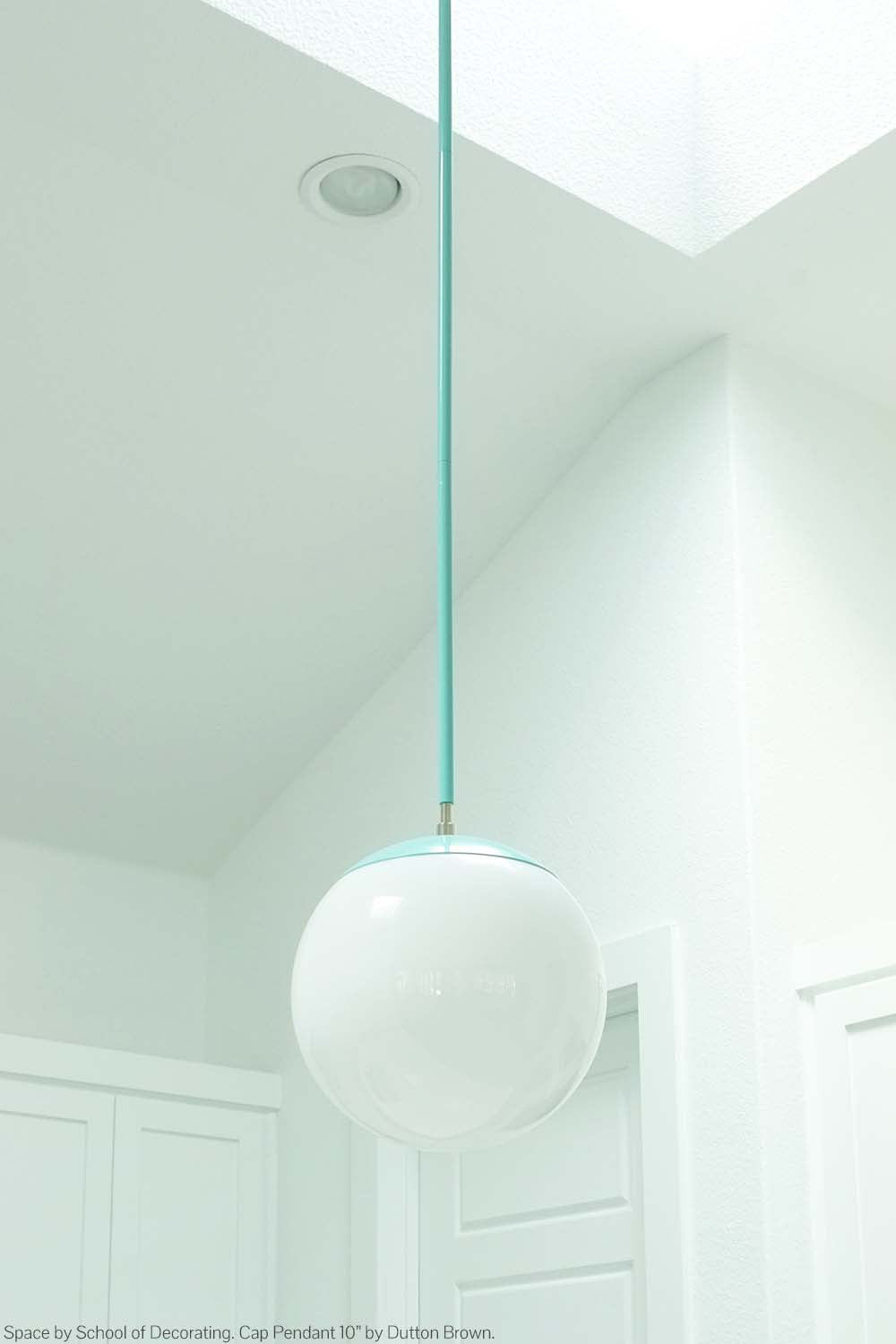 Brass and spa color Cap pendant 10" by Dutton Brown. Space by School of Decorating.