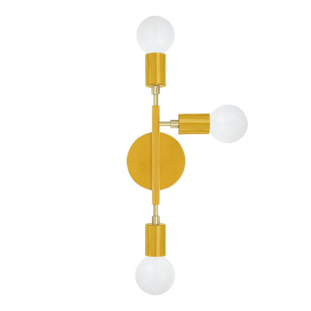 Brass and ochre color Elite sconce right Dutton Brown lighting