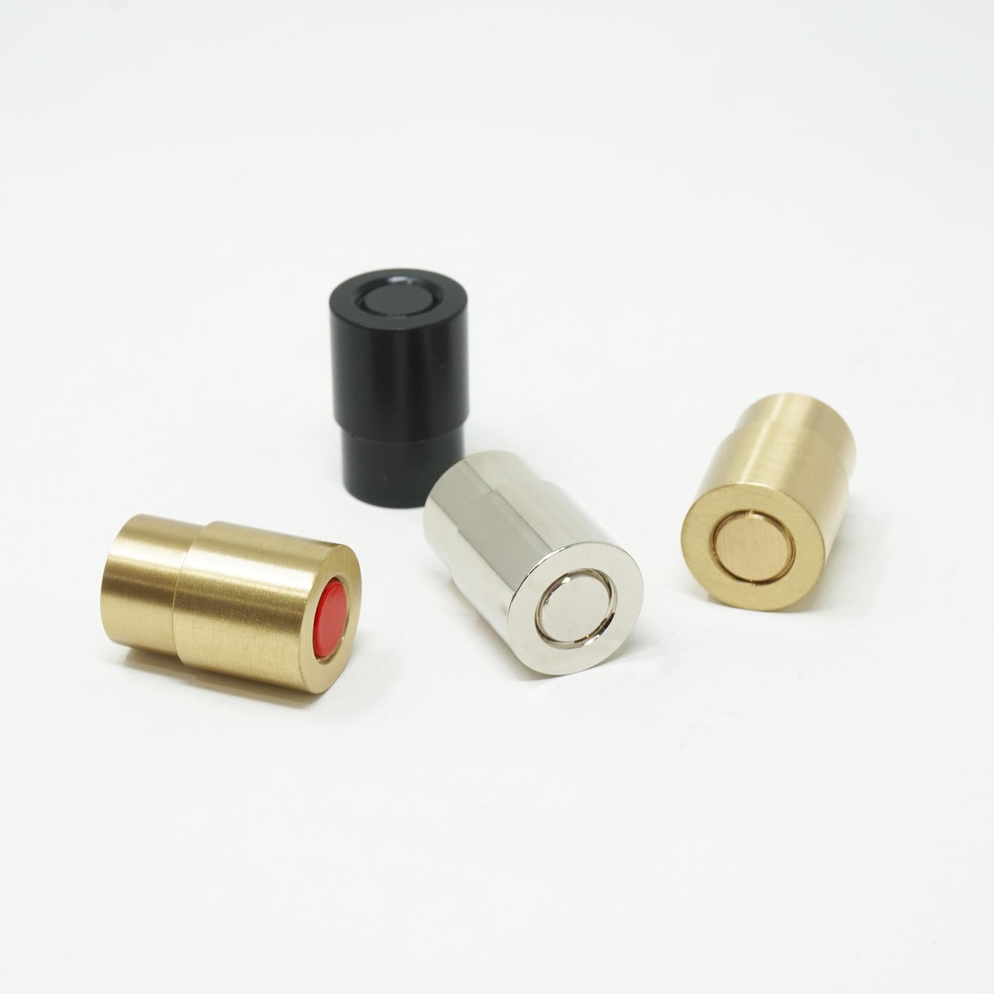 Brass and red, black, nickel, and brass Head knob Dutton Brown hardware