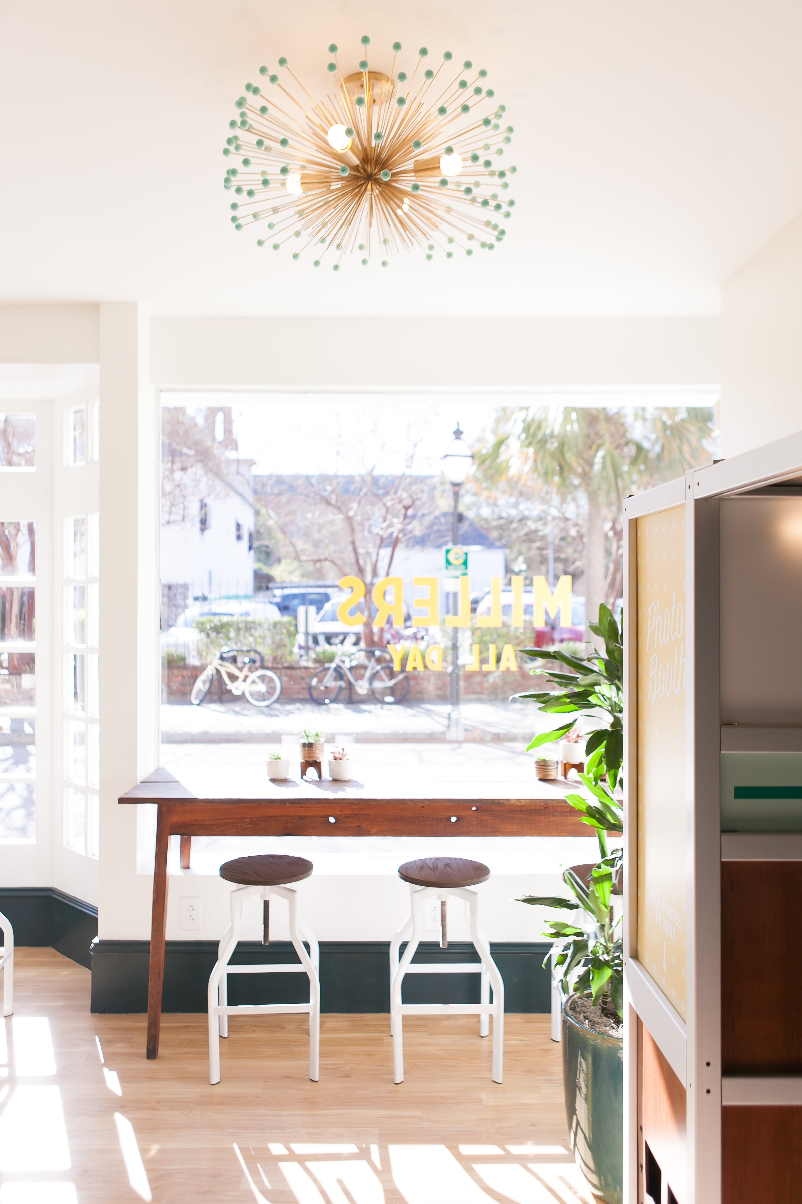 Brass and spa color Beaded Urchin chandelier 27" by Dutton Brown. Space and photo  by Leslie McKellar.