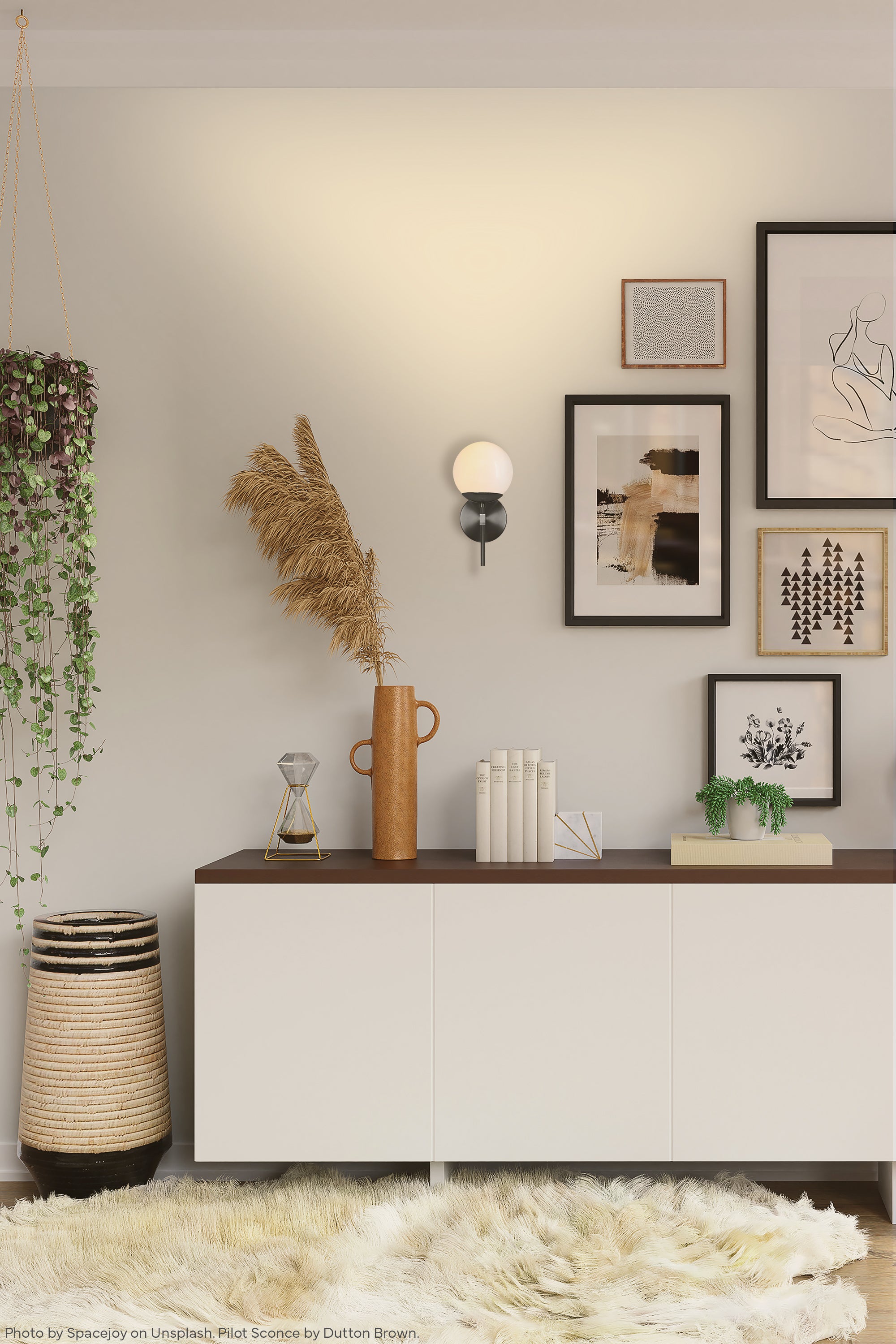 Black Lolli sconce 6" by by Dutton Brown. Photo by Spacejoy via Unsplash. _hover