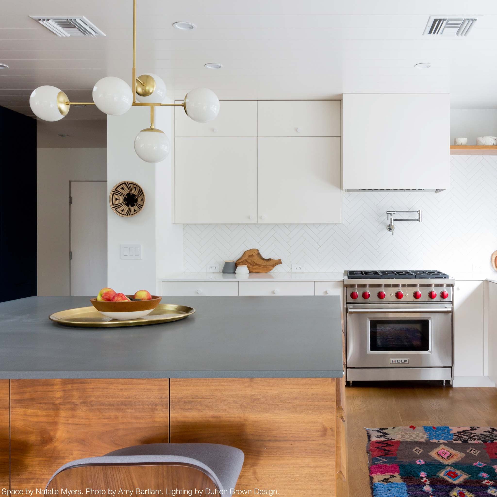 Brass Prisma chandelier 35" by Dutton Brown. Space by Natalie Myers. Photo by Amy Bartlam. _hover