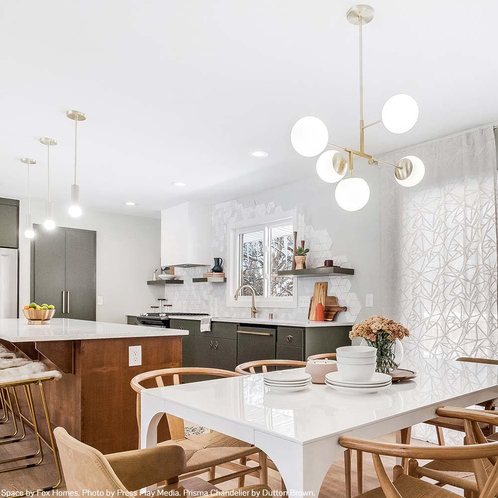 Nickel Prisma chandelier 35" by Dutton Brown. Space by Fox Homes. Photo by Press Play Media.