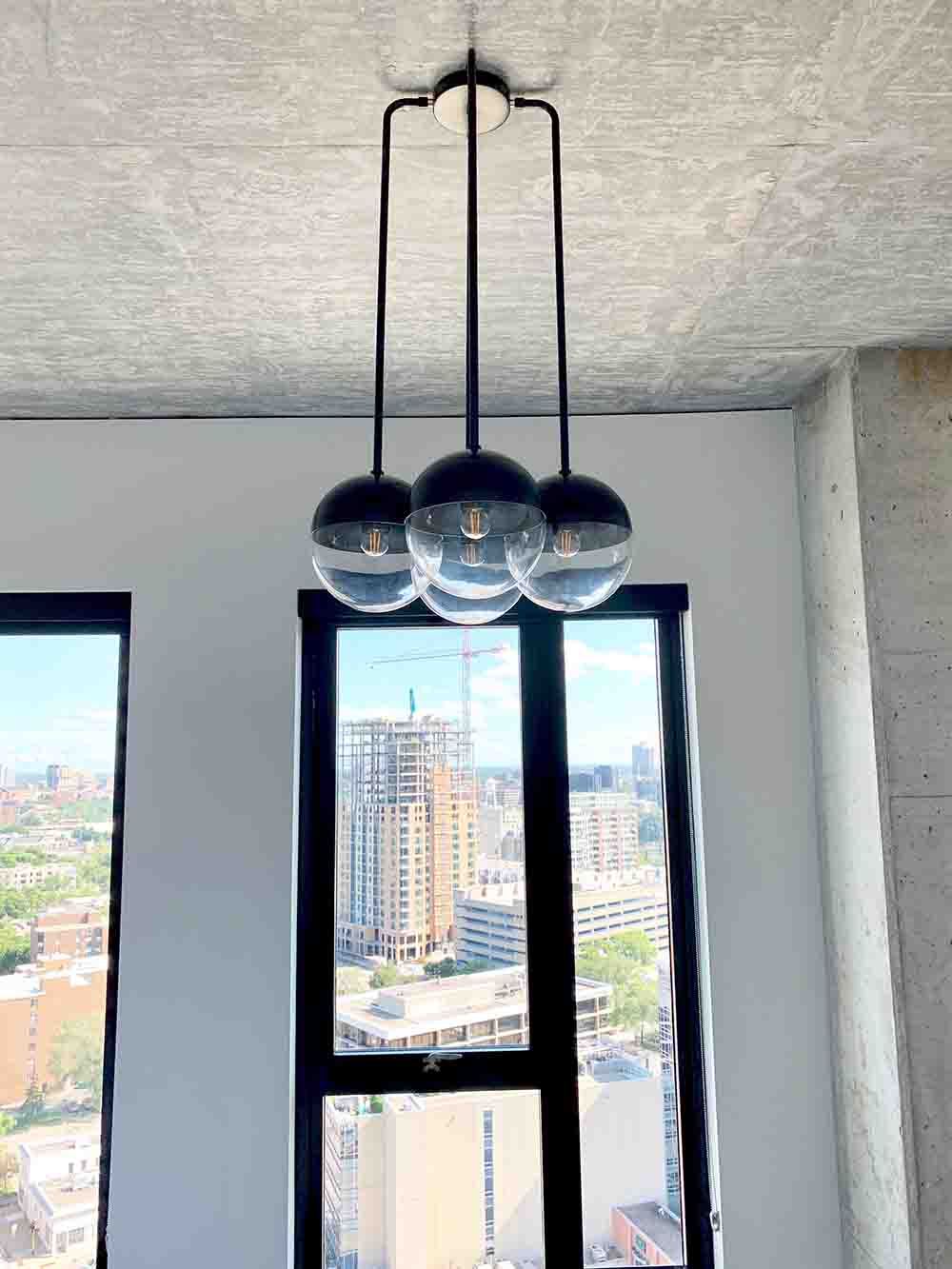 Nickel and black color Reign chandelier by Dutton Brown