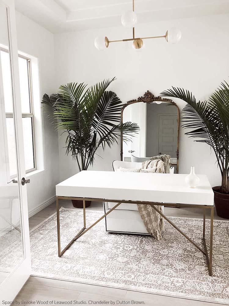 Brass Status flush mount 35" by Dutton Brown. Space and photo by Leawood Studio.