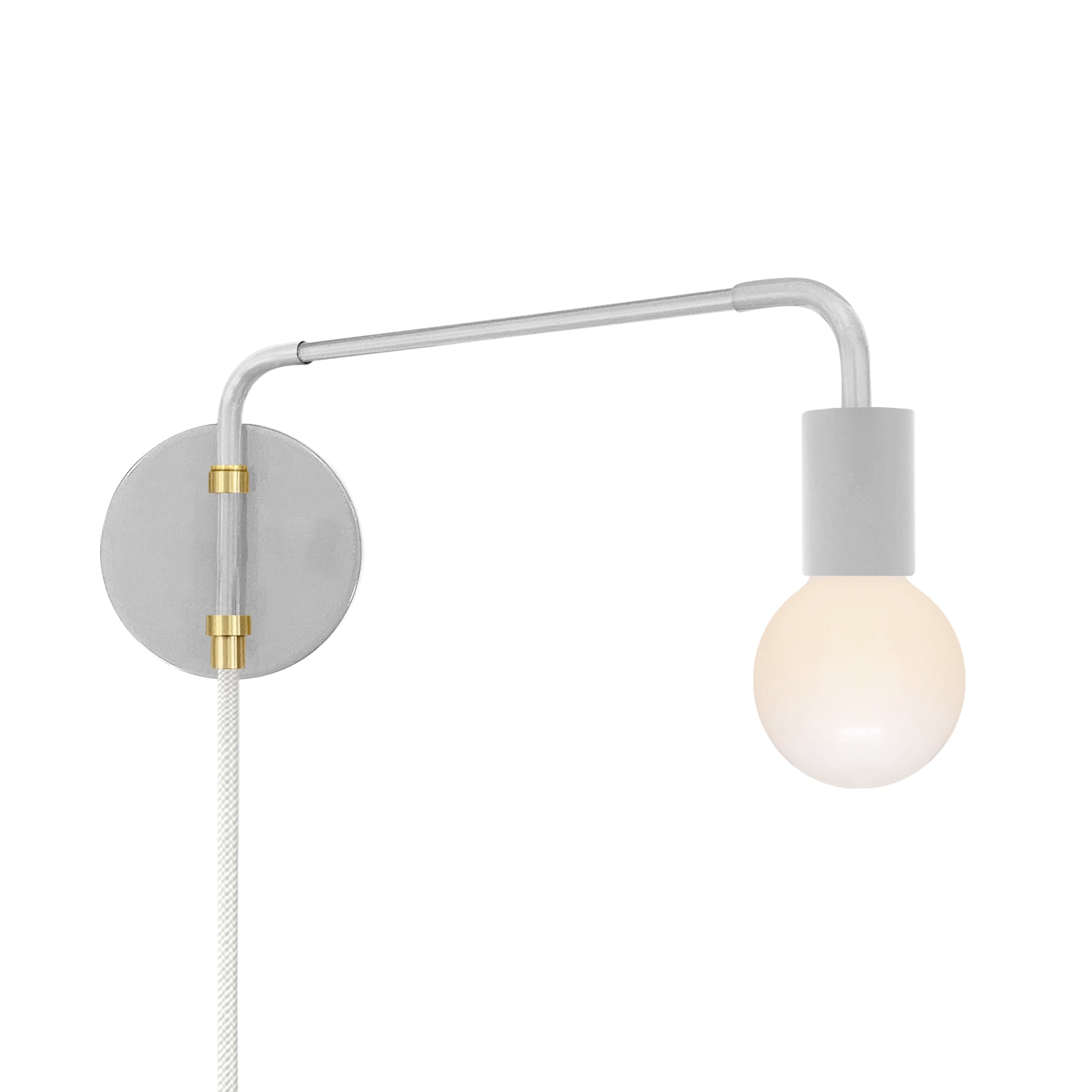 Brass and chalk color Sway plug-in sconce Dutton Brown lighting