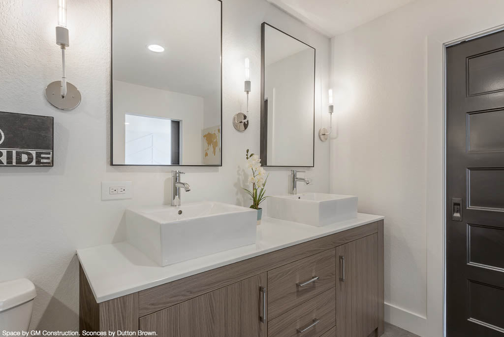white nickel tall snug sconce wall lighting bathroom vanity lighting dutton brown. Space by GM Construction.