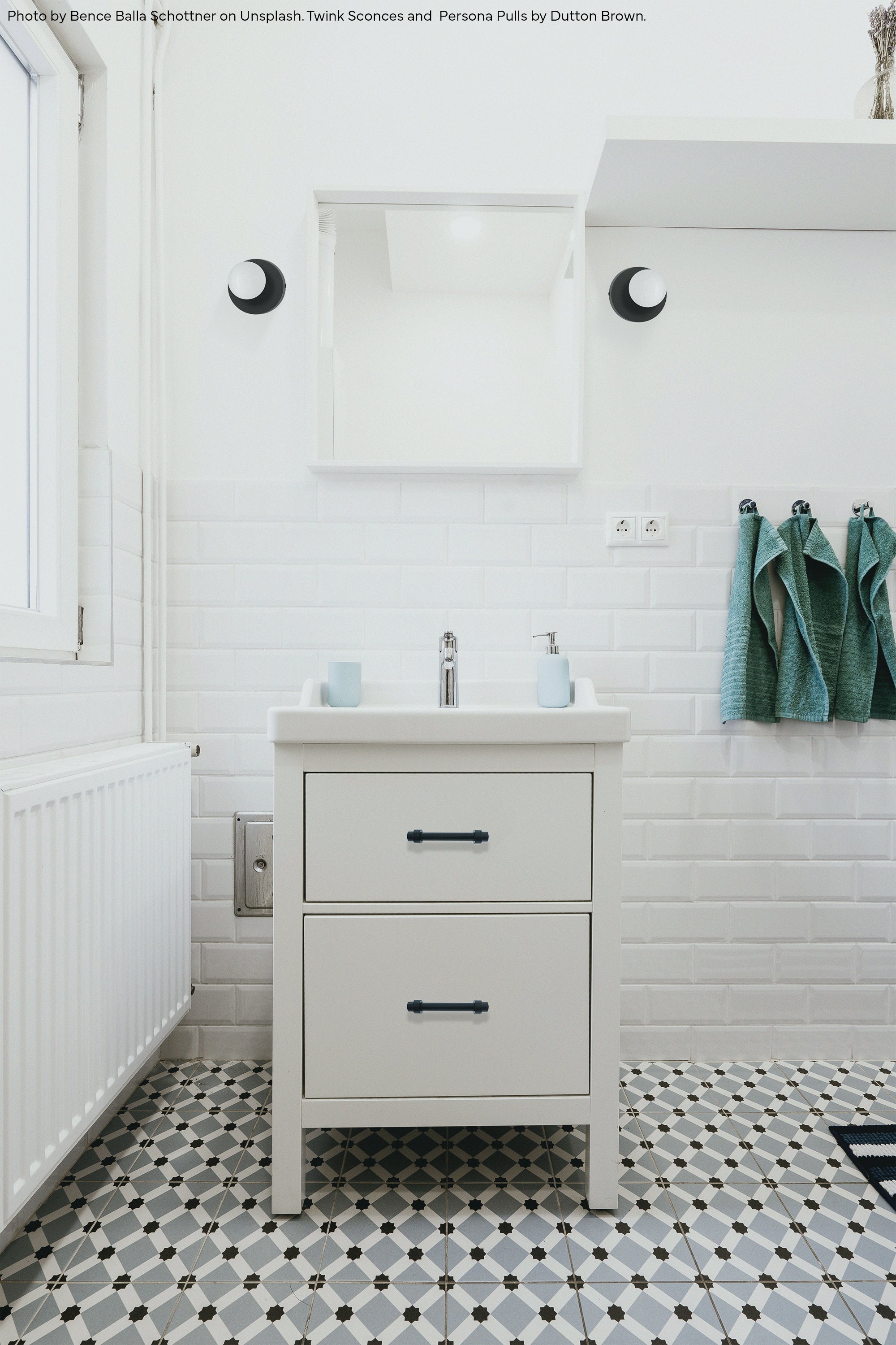 Black Twink sconce by Dutton Brown. Photo by Bence Balla Schottner on Unsplash. _hover
